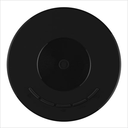 Black circular wireless charging pad with textured center and button indentations for yt200 mini projector use with korean skin care apps