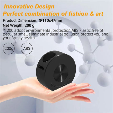 Black circular abs plastic device with textured disc and side openings for yt200 usb rechargeable mini projector skin care use